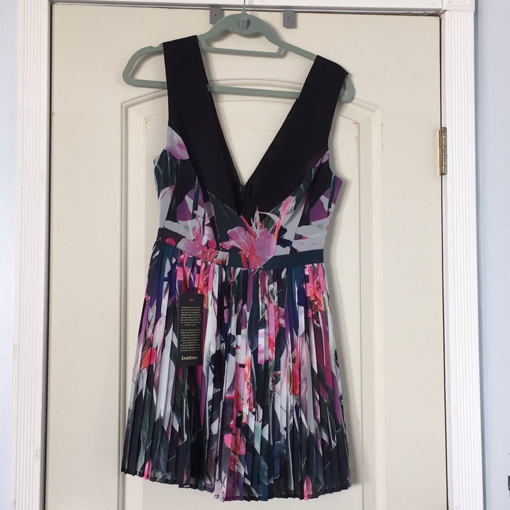New with Tags! - Gorgeous Bebe deep V Neck dress